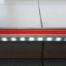 Самоклеющийся алюминиевый анодированный накладной угол-порог GlowStep-45 с светодиодной подсветкой 45 мм 2 метра матовый черный, цвет вставки бежевый